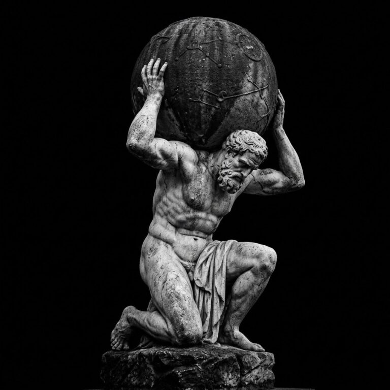 A marble statue of Atlas bearing a heavy stone sphere, a chosen load carried well